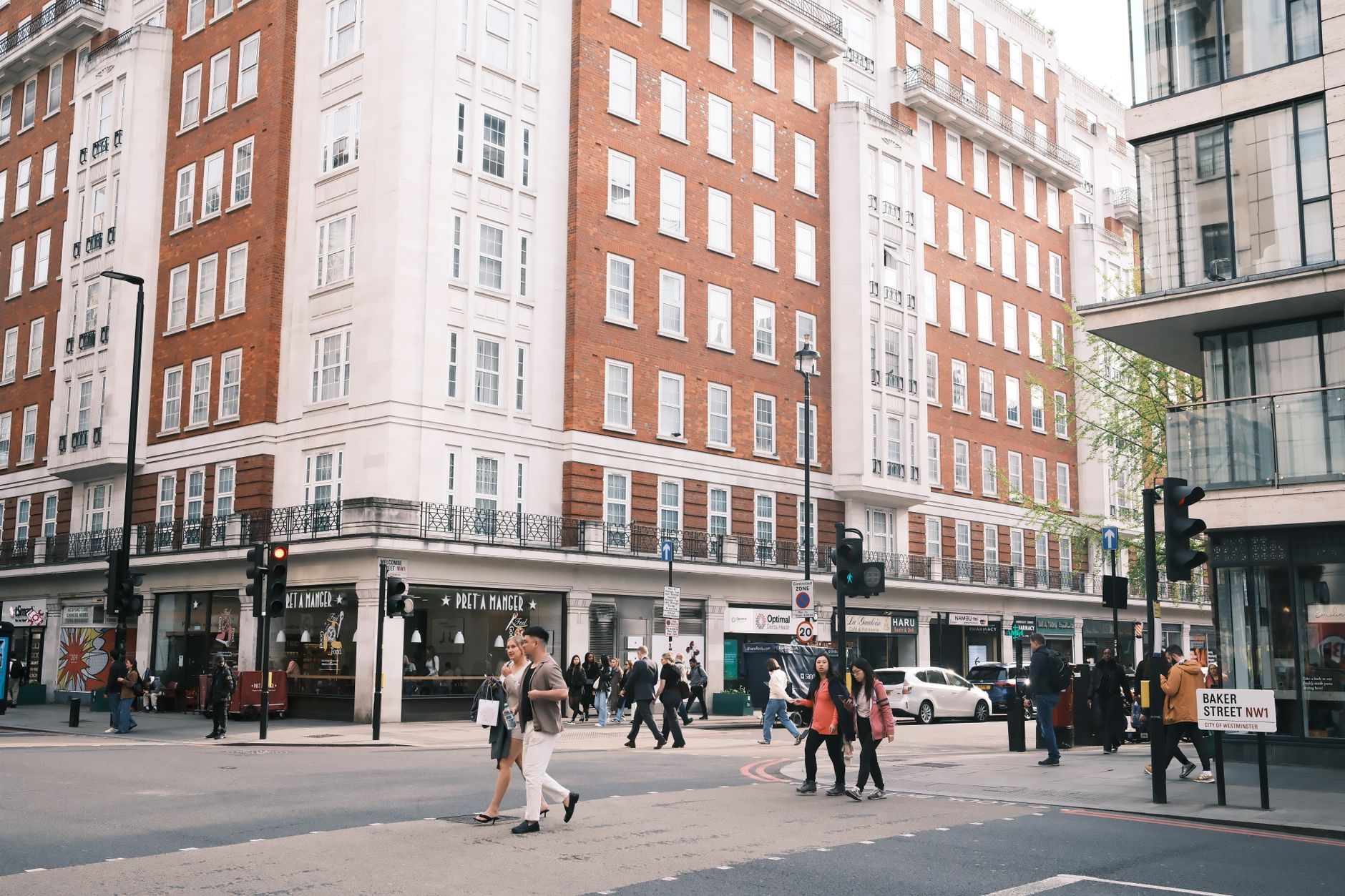 Workers gather in a London business district as a report highlights the economic value of improving workforce health.