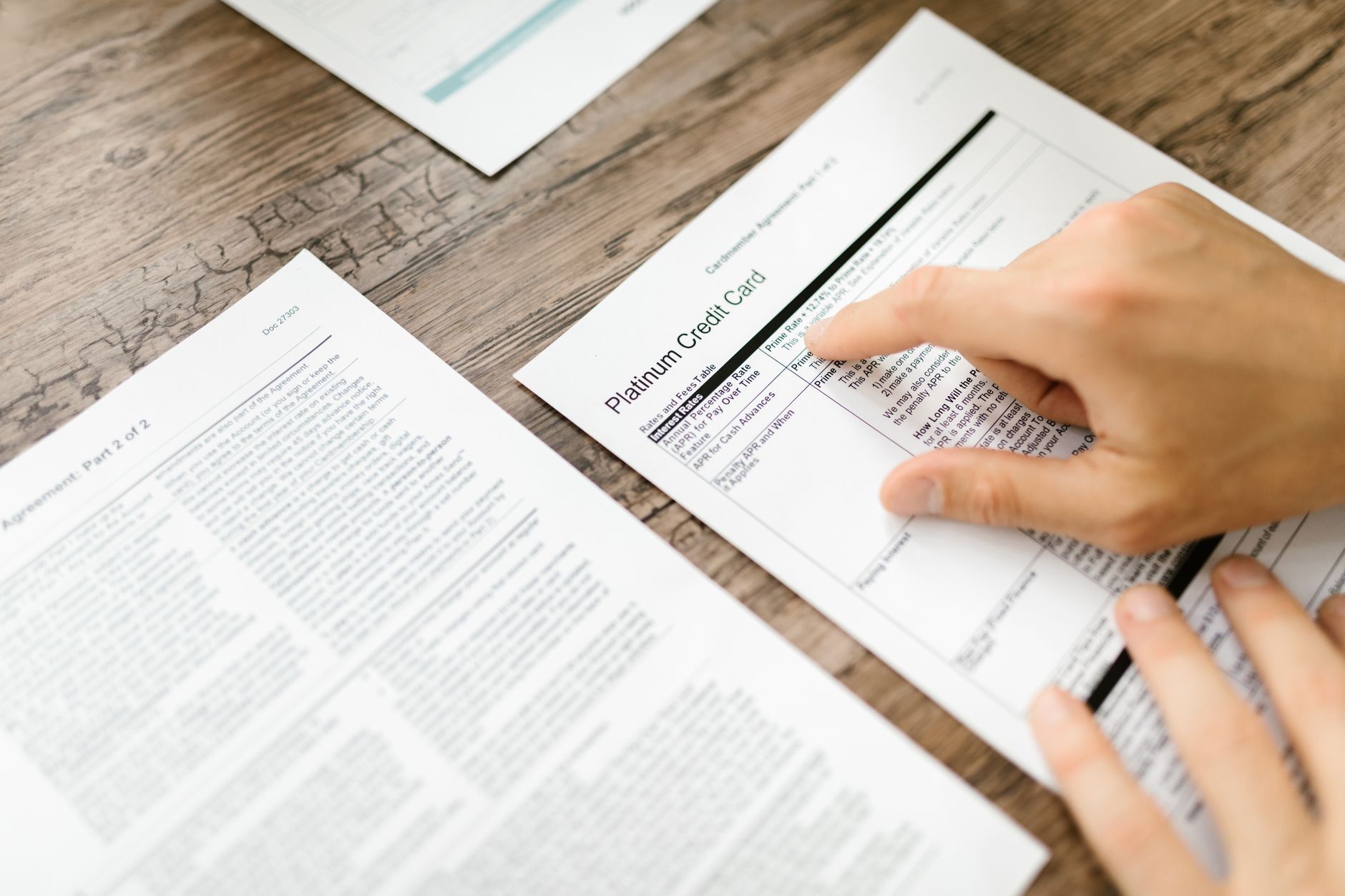A financial adviser reviews disclosure documents with a client as SEC regulatory oversight remains in focus for registered investment advisers.