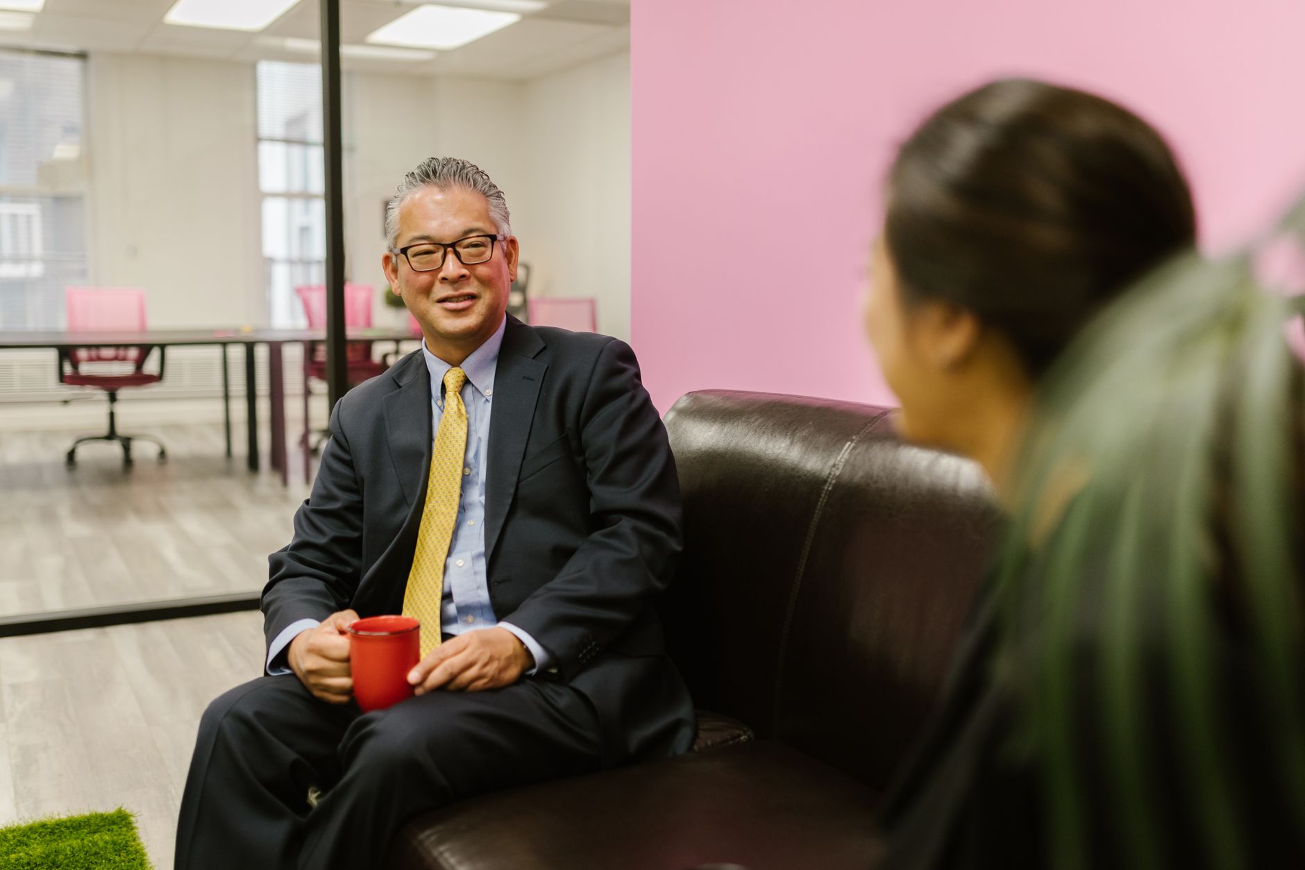 Independent wealth advisors discuss succession planning strategies during a professional client meeting.