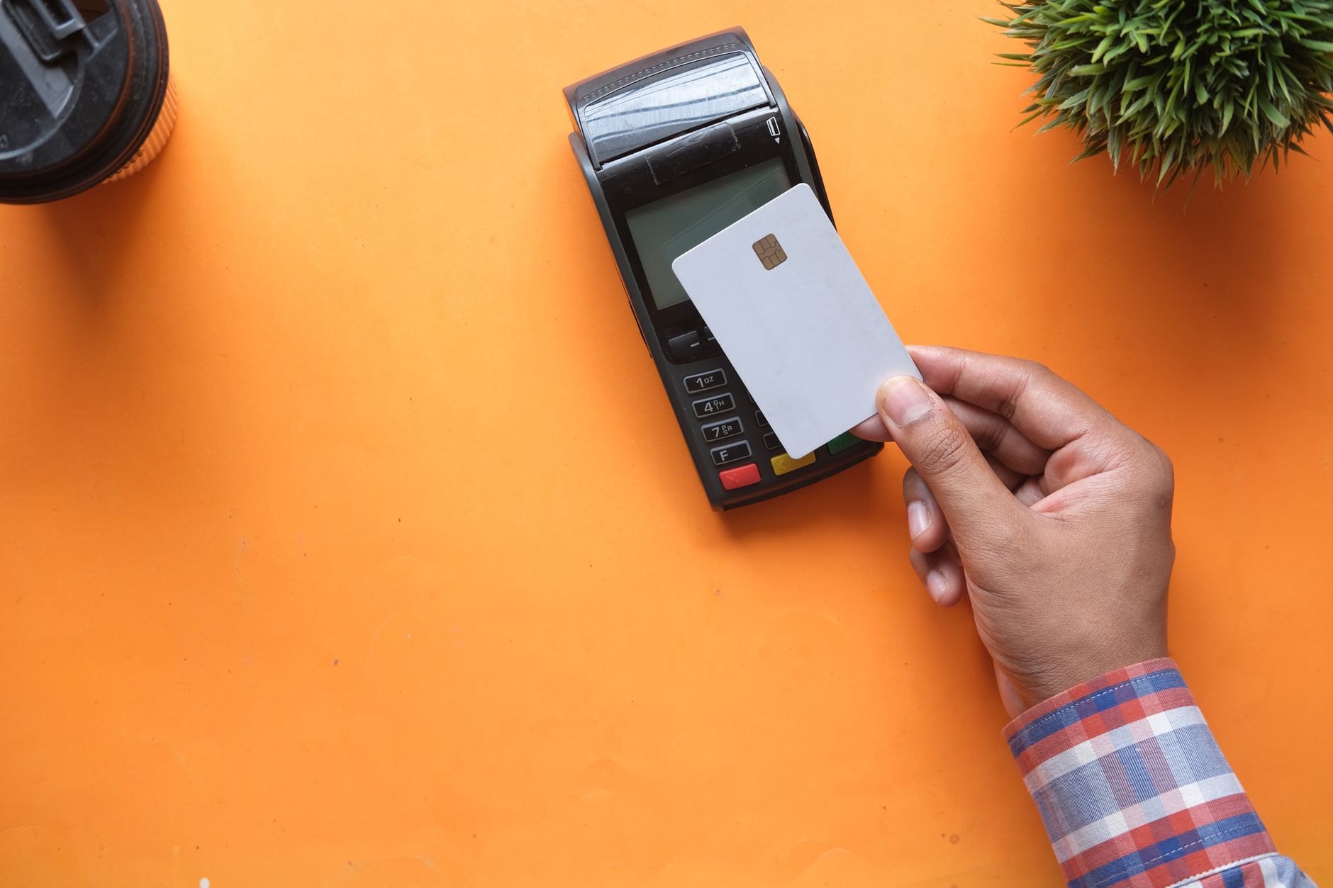 An AI shopping agent uses a tokenized Mastercard credential through Alchemy AgentCard to complete an authorized online purchase.