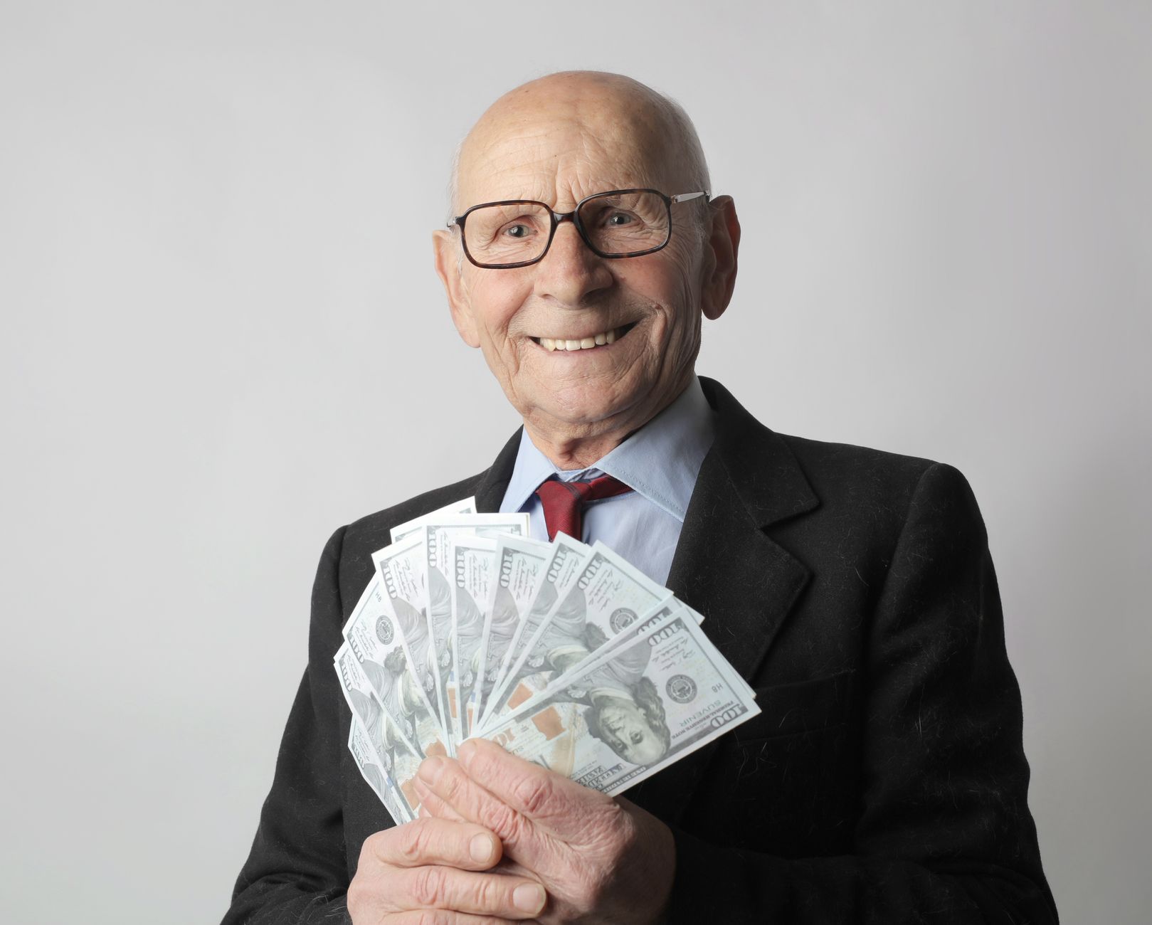 A retirement investor reviews long-term savings and portfolio allocations as U.S. workplace account balances reach record levels.