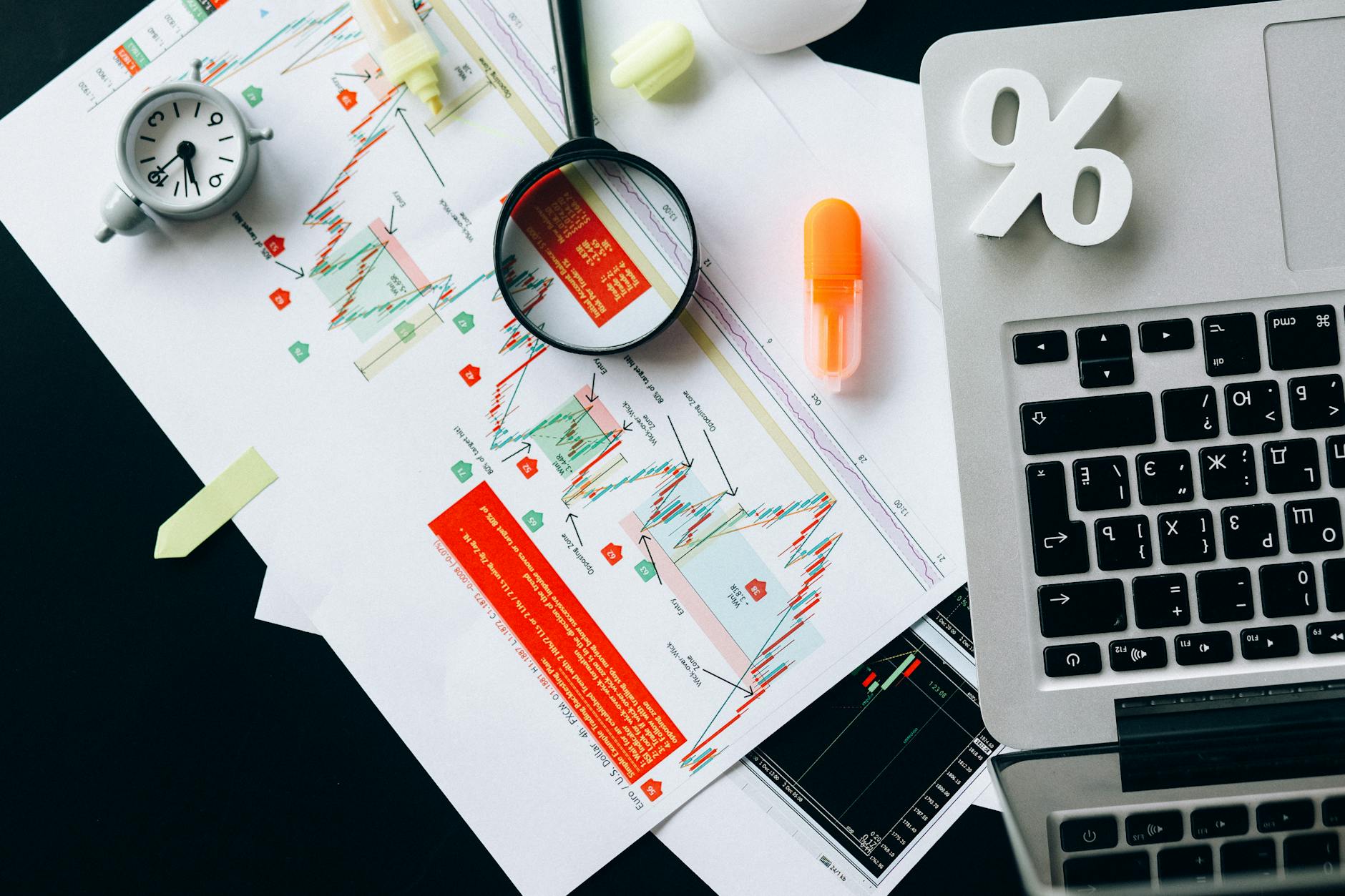 A financial advisor reviews bond ETF allocation data with a client on a market dashboard.