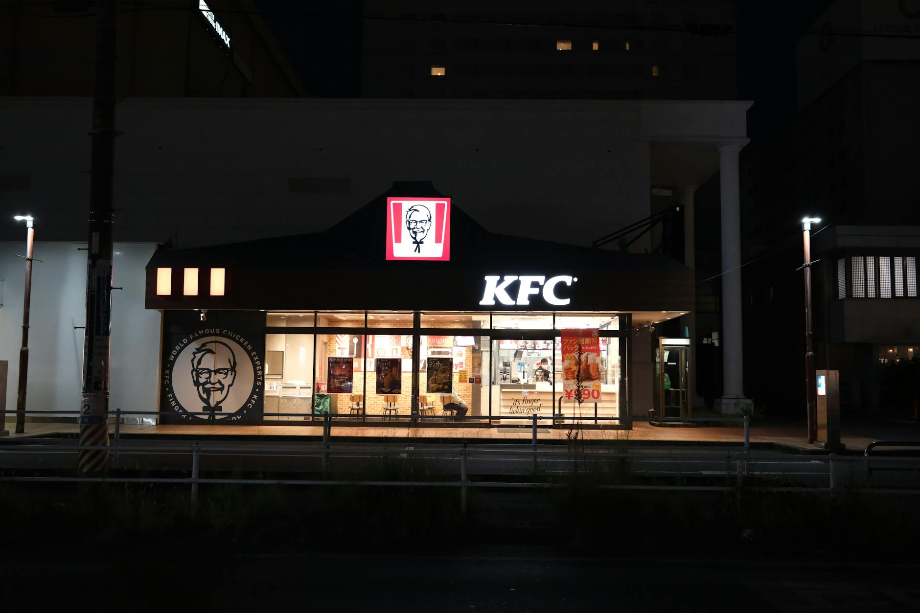 Customers ordering and dining inside a McDonald's restaurant during a busy service period