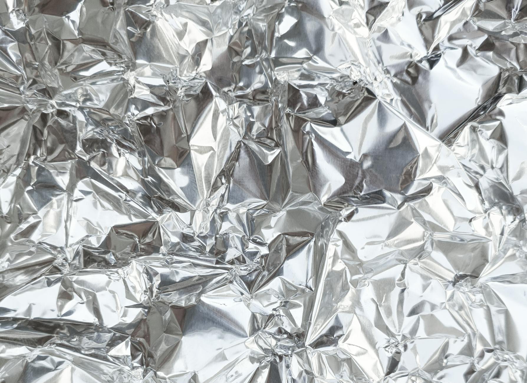 Silver bars are stacked as India tightens import rules to reduce bullion inflows and ease pressure on the rupee.