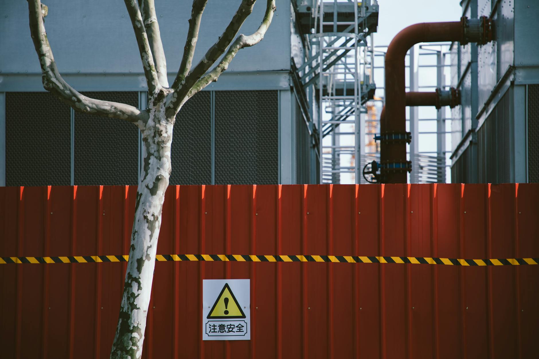 Workers operate machinery on a manufacturing line in a Chinese factory as export shipments are prepared.