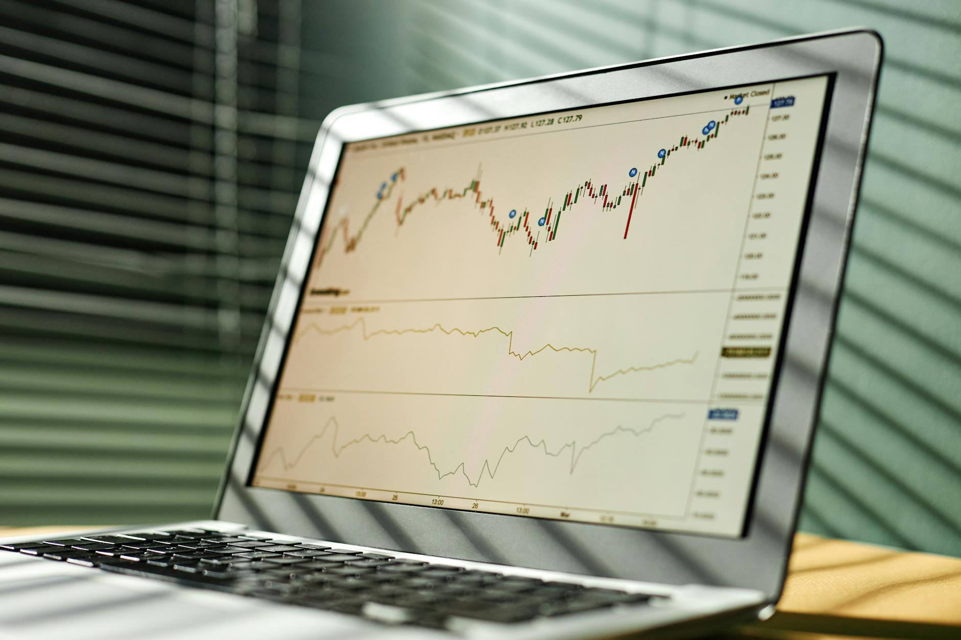 A financial professional reviews ETF market data on a trading screen as new structured-income funds begin trading.