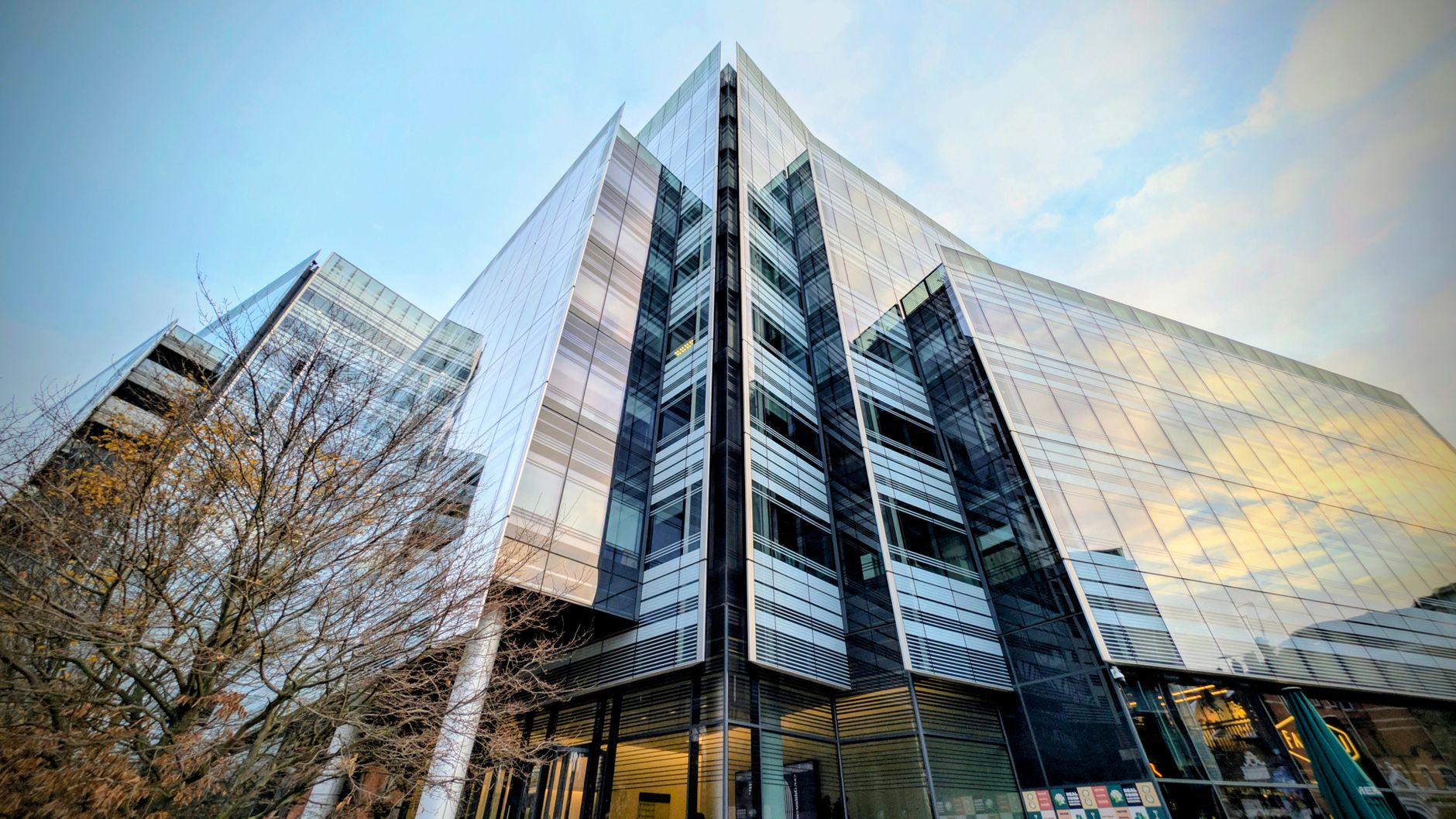NatWest headquarters and banking executives representing the group’s first-half 2026 earnings announcement and upgraded financial outlook.