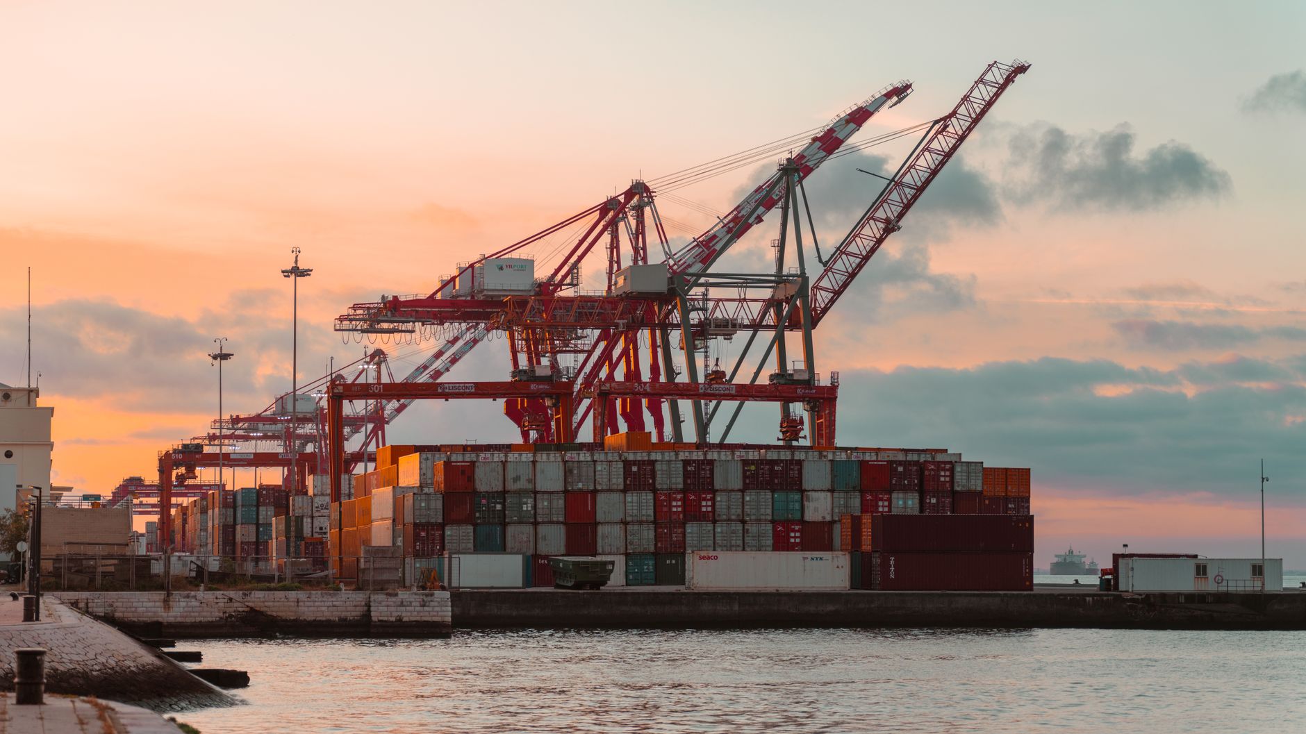 Shipping containers and cargo-handling equipment illustrate Mexico’s expanding non-oil merchandise trade.