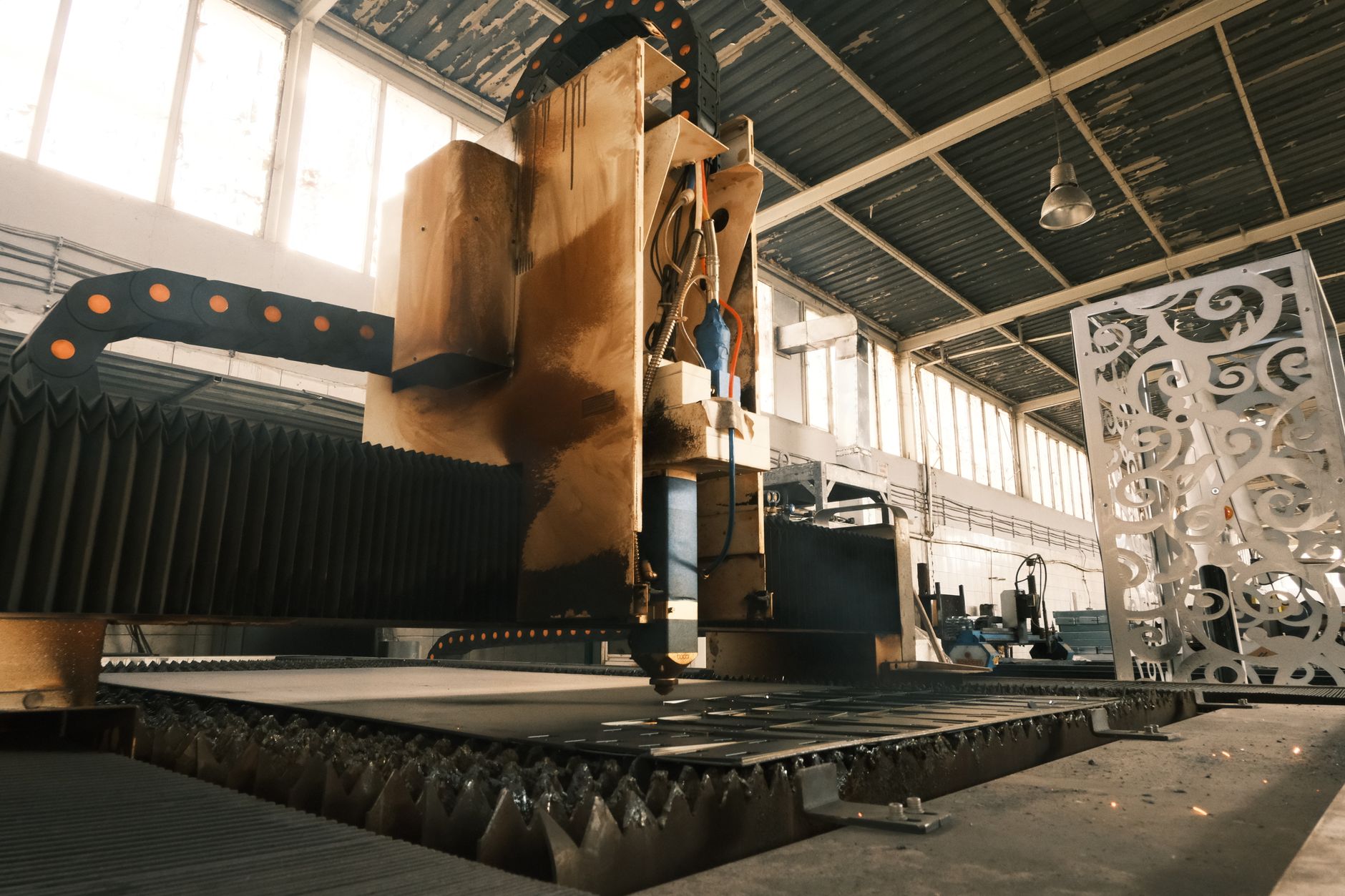 Workers operate inside a Chinese manufacturing facility as July purchasing managers’ data signal contraction across factories and services.