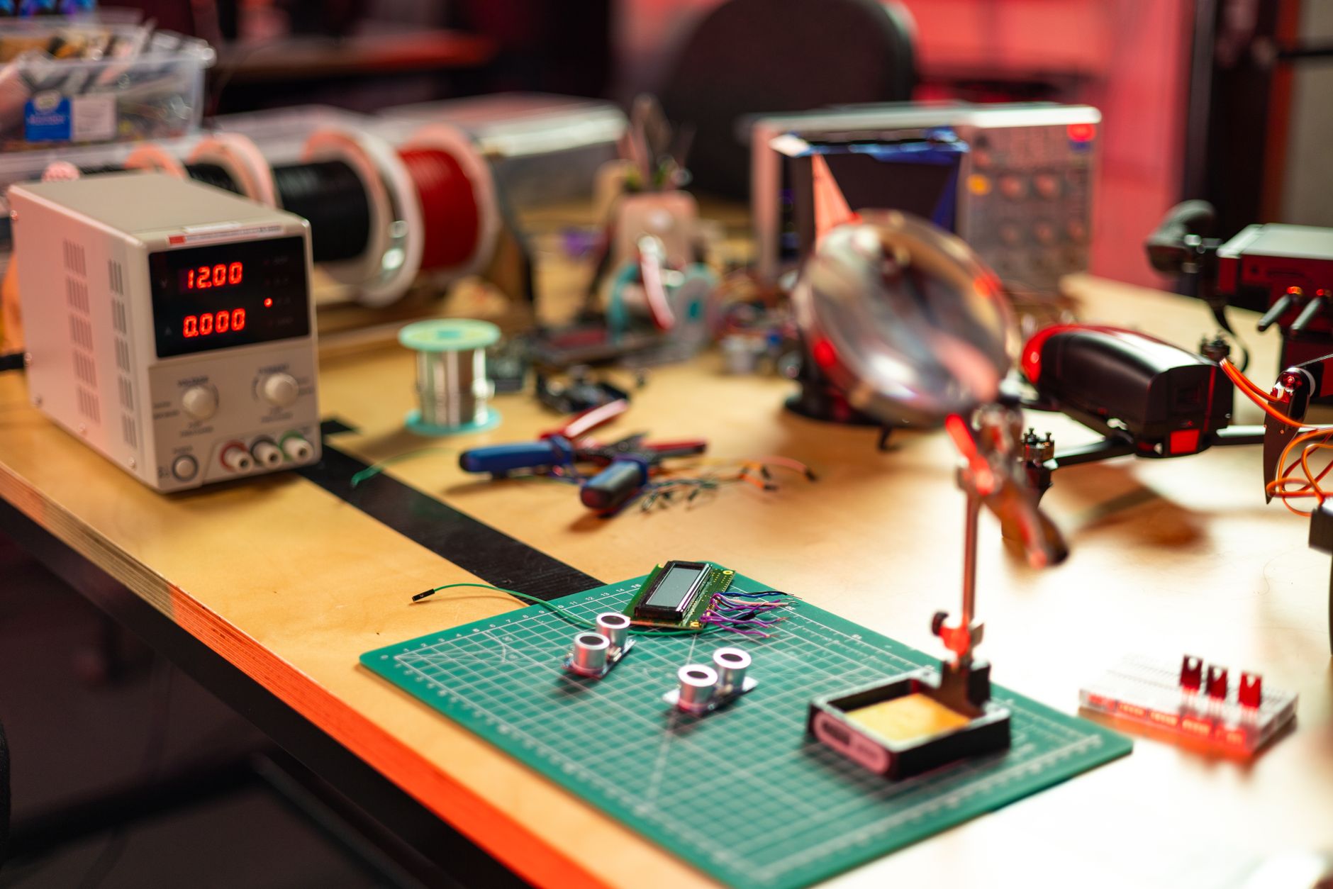 Engineers examine silicon-photonics wafers in a semiconductor research facility supporting next-generation AI infrastructure.