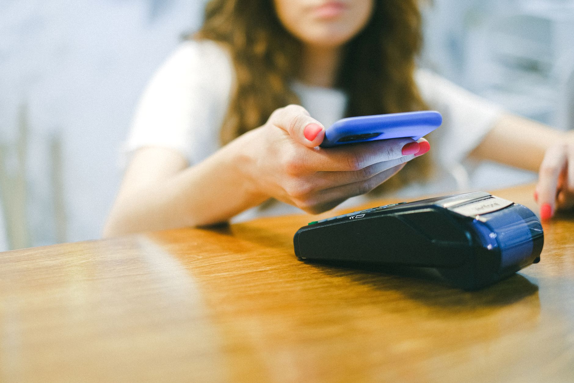 Block executives and users interact with digital payment products representing the company’s Square and Cash App financial ecosystem.