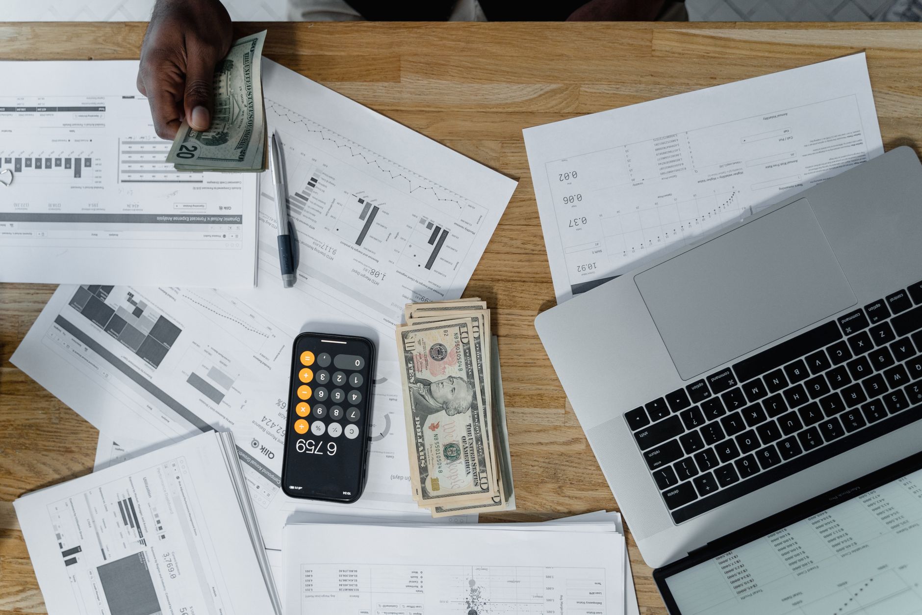 A financial advisor discusses long-term wealth planning strategies with affluent clients during a professional meeting.